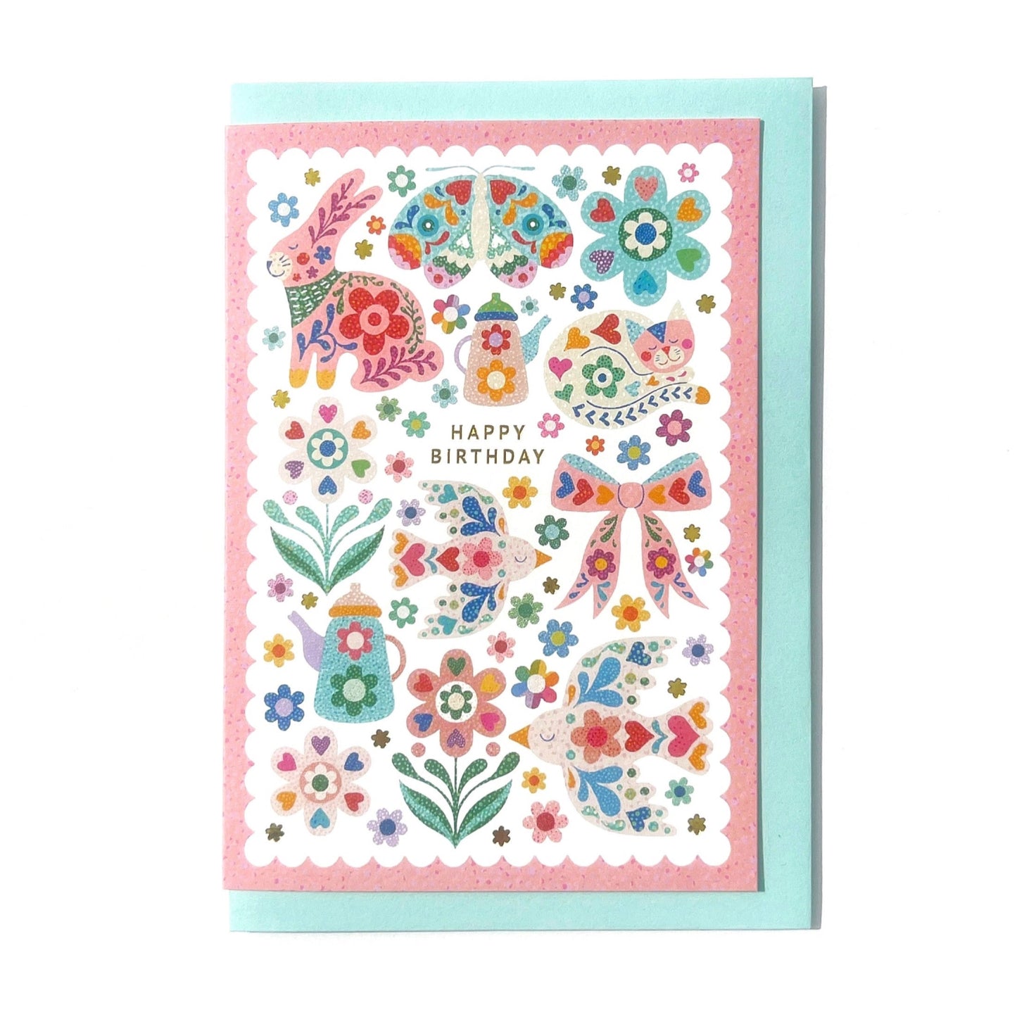 Luxury greeting card with gold foil, displaying a happy birthday message and floral motifs