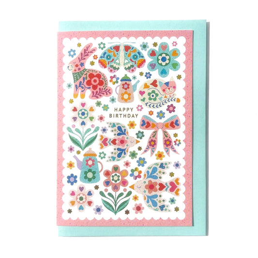 Luxury greeting card with gold foil, displaying a happy birthday message and floral motifs